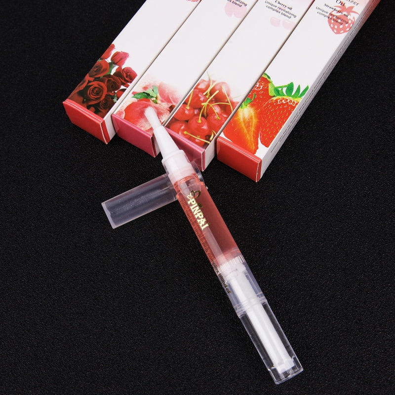 Applying nail nutrition oil pen to cuticles