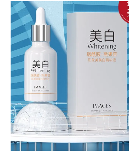 Gold face serum dropper bottle close-up