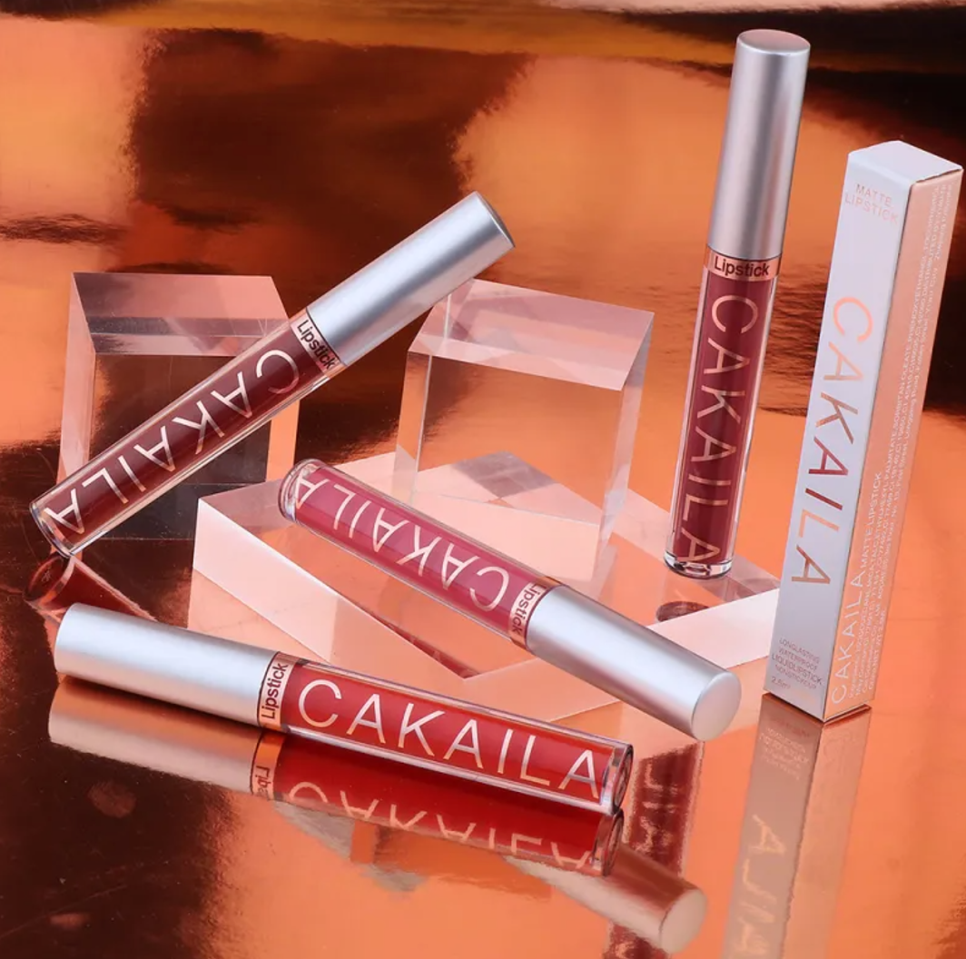 Applying waterproof lip gloss to lips