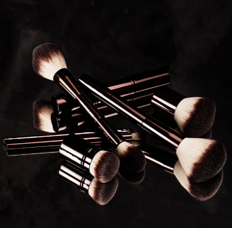 Makeup brushes on marble surface